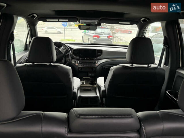 Белый Хонда Пасспорт, объемом двигателя 3.47 л и пробегом 50 тыс. км за 28000 $, фото 19 на Automoto.ua