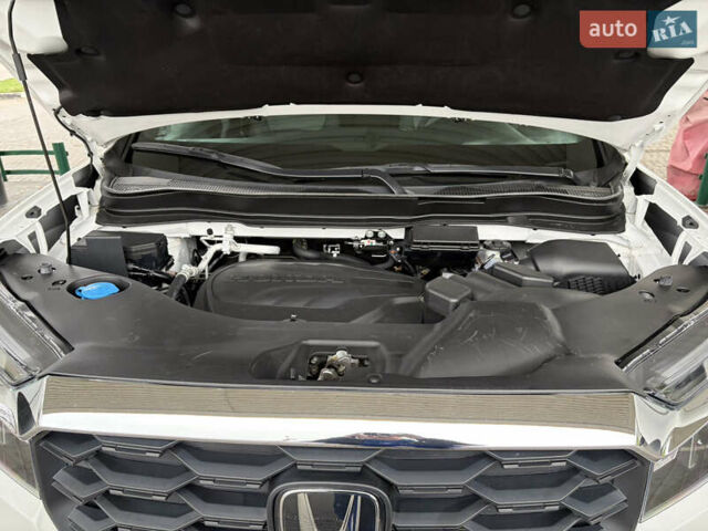 Белый Хонда Пасспорт, объемом двигателя 3.47 л и пробегом 50 тыс. км за 28000 $, фото 33 на Automoto.ua