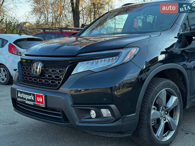 Черный Хонда Пасспорт, объемом двигателя 3.5 л и пробегом 159 тыс. км за 22490 $, фото 2 на Automoto.ua