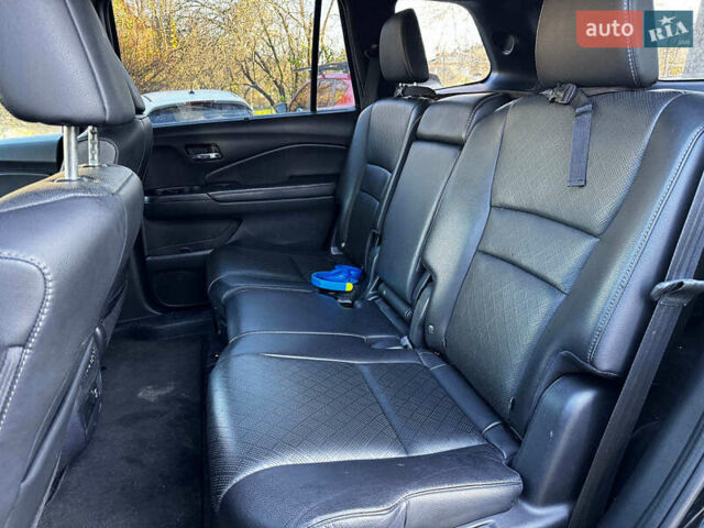 Черный Хонда Пасспорт, объемом двигателя 3.5 л и пробегом 159 тыс. км за 22490 $, фото 23 на Automoto.ua