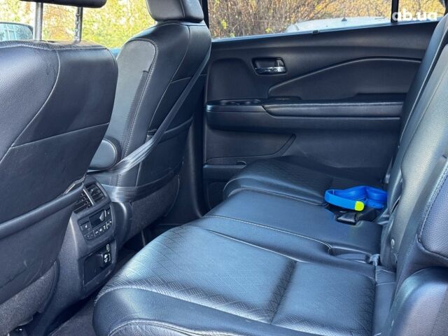 Черный Хонда Пасспорт, объемом двигателя 3.5 л и пробегом 159 тыс. км за 22490 $, фото 22 на Automoto.ua
