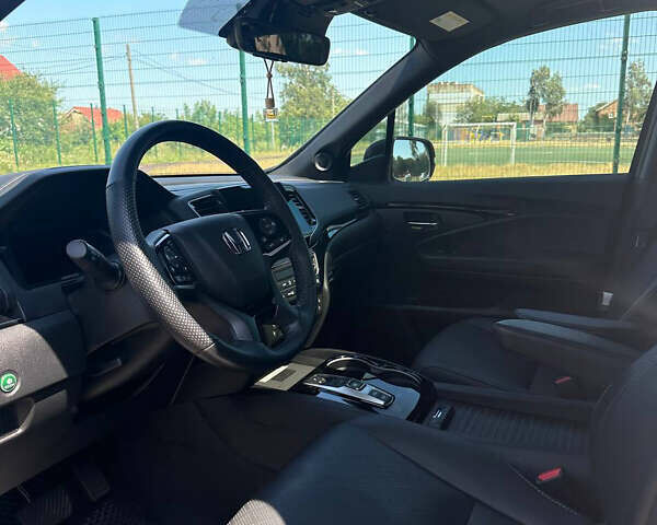 Чорний Хонда Пасспорт, об'ємом двигуна 3.47 л та пробігом 90 тис. км за 32000 $, фото 8 на Automoto.ua