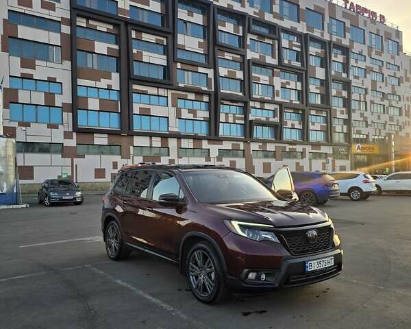 Красный Хонда Пасспорт, объемом двигателя 3.47 л и пробегом 87 тыс. км за 21999 $, фото 7 на Automoto.ua