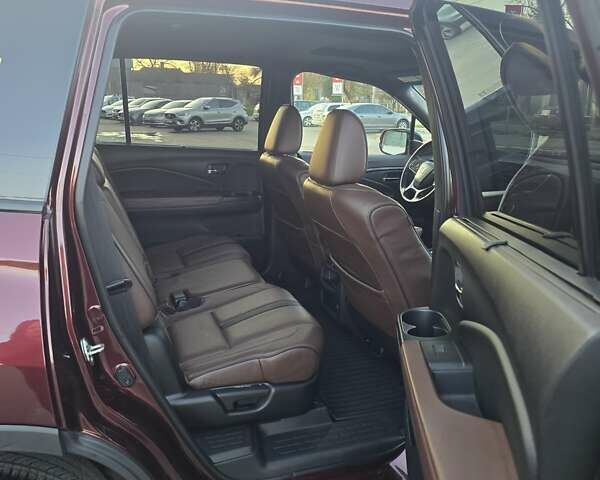 Красный Хонда Пасспорт, объемом двигателя 3.47 л и пробегом 87 тыс. км за 21999 $, фото 13 на Automoto.ua