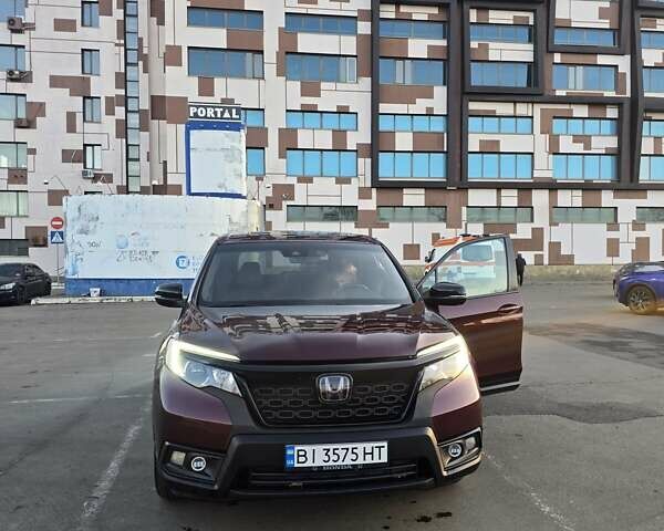 Красный Хонда Пасспорт, объемом двигателя 3.47 л и пробегом 87 тыс. км за 21999 $, фото 8 на Automoto.ua