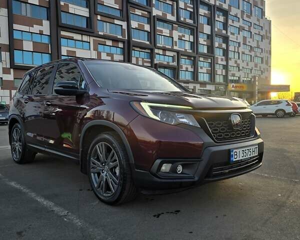 Красный Хонда Пасспорт, объемом двигателя 3.47 л и пробегом 87 тыс. км за 21999 $, фото 4 на Automoto.ua