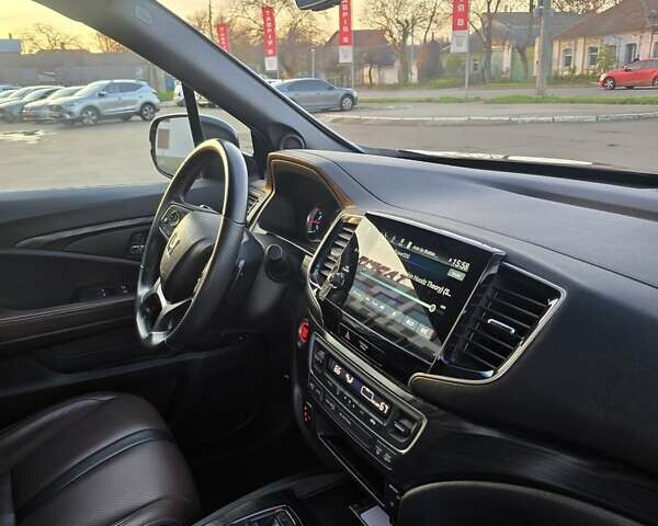 Красный Хонда Пасспорт, объемом двигателя 3.47 л и пробегом 87 тыс. км за 21999 $, фото 18 на Automoto.ua