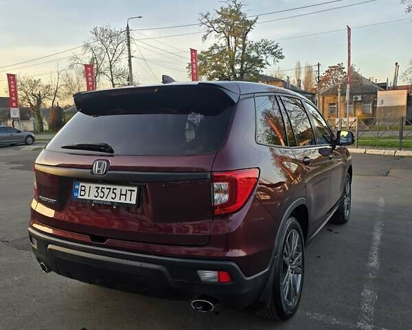 Красный Хонда Пасспорт, объемом двигателя 3.47 л и пробегом 87 тыс. км за 21999 $, фото 9 на Automoto.ua