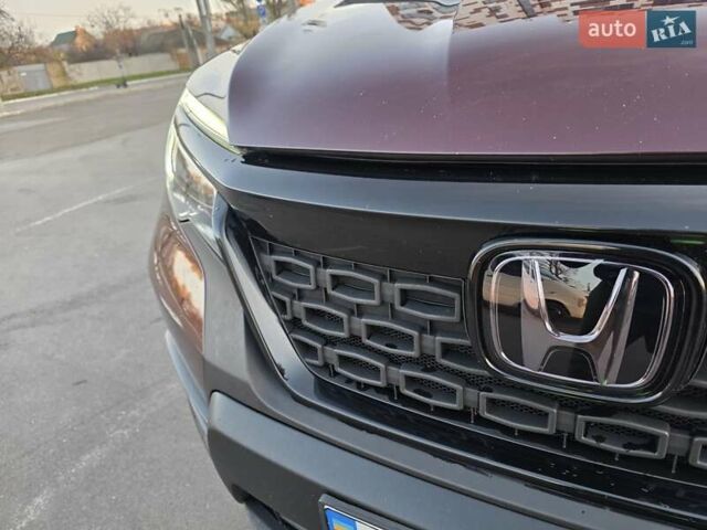 Красный Хонда Пасспорт, объемом двигателя 3.47 л и пробегом 87 тыс. км за 21999 $, фото 43 на Automoto.ua