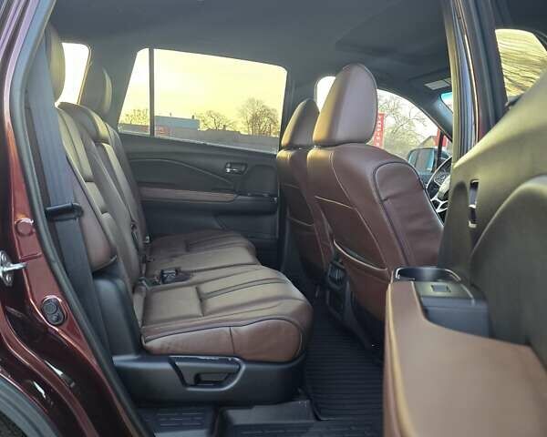 Красный Хонда Пасспорт, объемом двигателя 3.47 л и пробегом 87 тыс. км за 21999 $, фото 11 на Automoto.ua