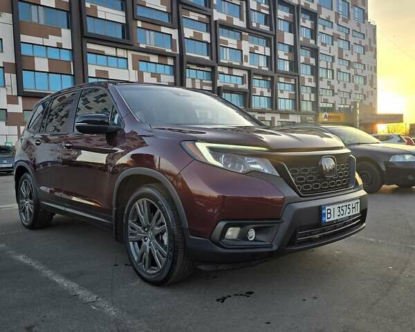 Красный Хонда Пасспорт, объемом двигателя 3.47 л и пробегом 87 тыс. км за 21999 $, фото 6 на Automoto.ua