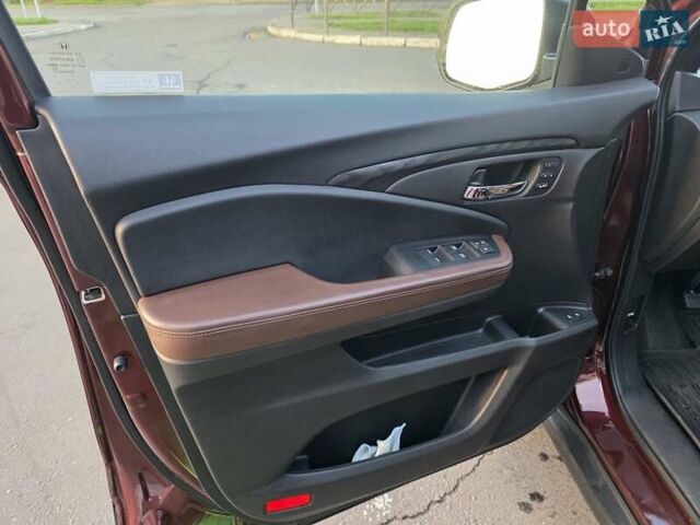 Красный Хонда Пасспорт, объемом двигателя 3.47 л и пробегом 87 тыс. км за 21999 $, фото 42 на Automoto.ua