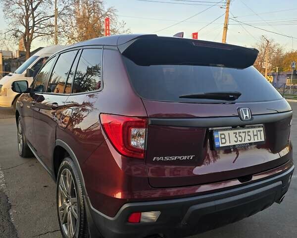 Красный Хонда Пасспорт, объемом двигателя 3.47 л и пробегом 87 тыс. км за 21999 $, фото 3 на Automoto.ua