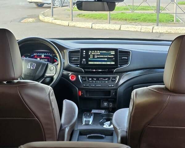 Красный Хонда Пасспорт, объемом двигателя 3.47 л и пробегом 87 тыс. км за 21999 $, фото 12 на Automoto.ua