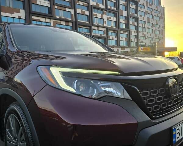 Красный Хонда Пасспорт, объемом двигателя 3.47 л и пробегом 87 тыс. км за 21999 $, фото 5 на Automoto.ua