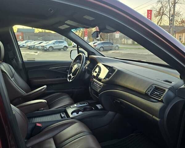 Красный Хонда Пасспорт, объемом двигателя 3.47 л и пробегом 87 тыс. км за 21999 $, фото 16 на Automoto.ua