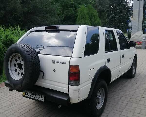 Хонда Пасспорт, об'ємом двигуна 2 л та пробігом 111 тис. км за 4000 $, фото 3 на Automoto.ua