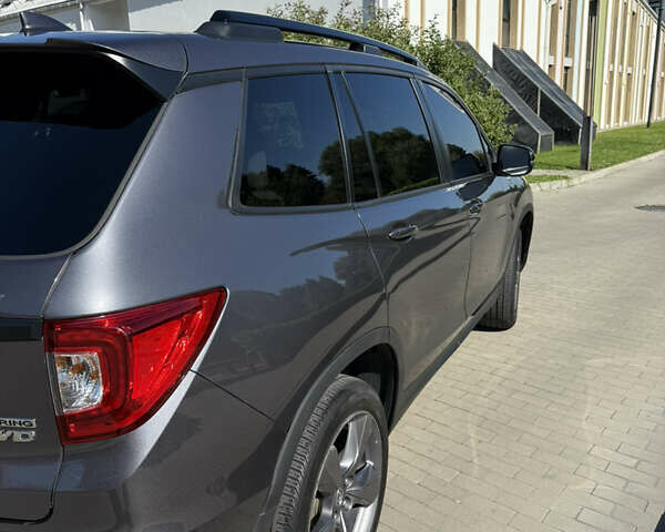 Сірий Хонда Пасспорт, об'ємом двигуна 3.47 л та пробігом 73 тис. км за 25000 $, фото 2 на Automoto.ua