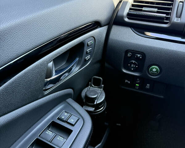 Сірий Хонда Пасспорт, об'ємом двигуна 3.47 л та пробігом 73 тис. км за 25000 $, фото 10 на Automoto.ua