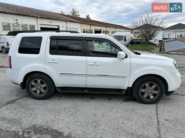 Белый Хонда Пилот, объемом двигателя 3.5 л и пробегом 288 тыс. км за 17530 $, фото 4 на Automoto.ua