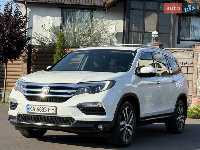 Белый Хонда Пилот, объемом двигателя 3.47 л и пробегом 74 тыс. км за 24300 $, фото 5 на Automoto.ua