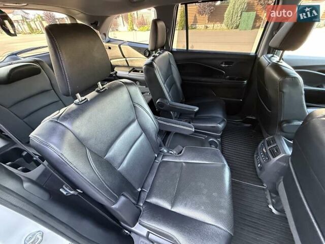 Белый Хонда Пилот, объемом двигателя 3.47 л и пробегом 74 тыс. км за 24300 $, фото 65 на Automoto.ua