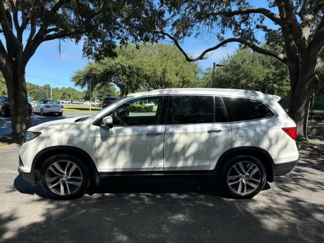 Белый Хонда Пилот, объемом двигателя 3.5 л и пробегом 70 тыс. км за 15000 $, фото 3 на Automoto.ua