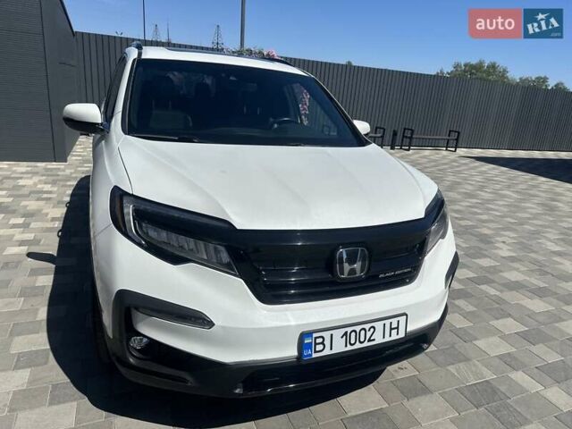 Білий Хонда Пілот, об'ємом двигуна 3.47 л та пробігом 51 тис. км за 34000 $, фото 14 на Automoto.ua