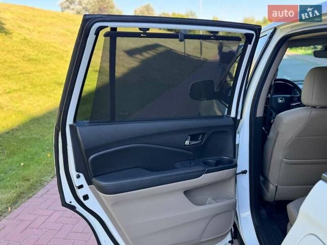Белый Хонда Пилот, объемом двигателя 3.47 л и пробегом 151 тыс. км за 27000 $, фото 26 на Automoto.ua