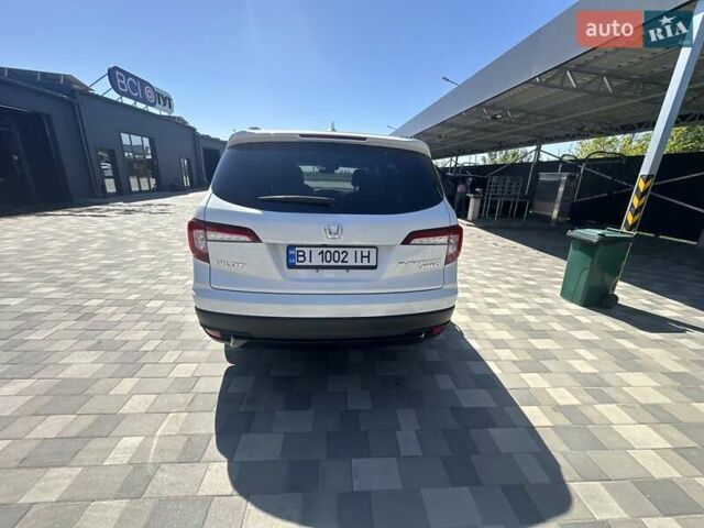Білий Хонда Пілот, об'ємом двигуна 3.47 л та пробігом 51 тис. км за 34000 $, фото 119 на Automoto.ua