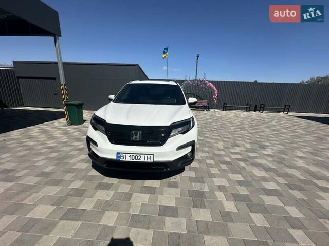 Білий Хонда Пілот, об'ємом двигуна 3.47 л та пробігом 51 тис. км за 34000 $, фото 83 на Automoto.ua