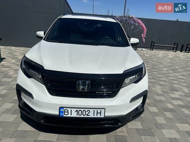 Білий Хонда Пілот, об'ємом двигуна 3.47 л та пробігом 51 тис. км за 34000 $, фото 11 на Automoto.ua