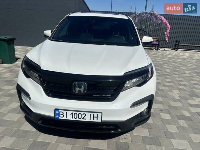 Білий Хонда Пілот, об'ємом двигуна 3.47 л та пробігом 51 тис. км за 34000 $, фото 10 на Automoto.ua