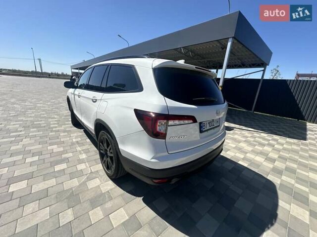 Білий Хонда Пілот, об'ємом двигуна 3.47 л та пробігом 51 тис. км за 34000 $, фото 125 на Automoto.ua