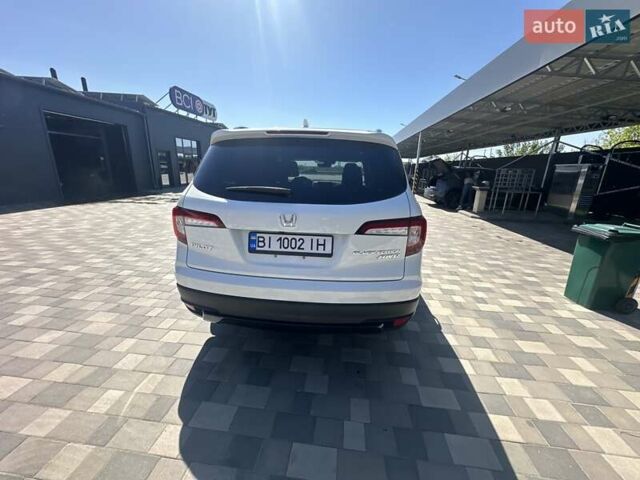 Білий Хонда Пілот, об'ємом двигуна 3.47 л та пробігом 51 тис. км за 34000 $, фото 118 на Automoto.ua