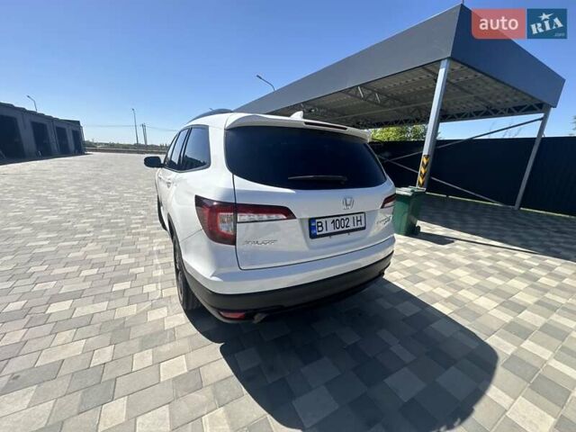 Білий Хонда Пілот, об'ємом двигуна 3.47 л та пробігом 51 тис. км за 34000 $, фото 123 на Automoto.ua