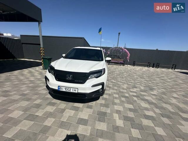 Білий Хонда Пілот, об'ємом двигуна 3.47 л та пробігом 51 тис. км за 34000 $, фото 82 на Automoto.ua