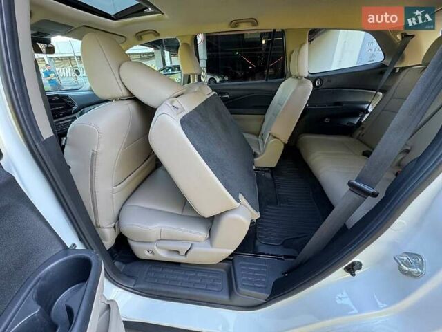 Белый Хонда Пилот, объемом двигателя 3.47 л и пробегом 151 тыс. км за 27000 $, фото 27 на Automoto.ua