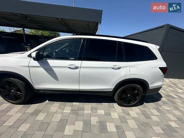 Білий Хонда Пілот, об'ємом двигуна 3.47 л та пробігом 51 тис. км за 34000 $, фото 66 на Automoto.ua