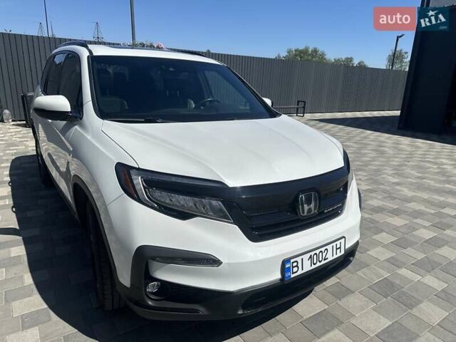 Білий Хонда Пілот, об'ємом двигуна 3.47 л та пробігом 51 тис. км за 34000 $, фото 16 на Automoto.ua
