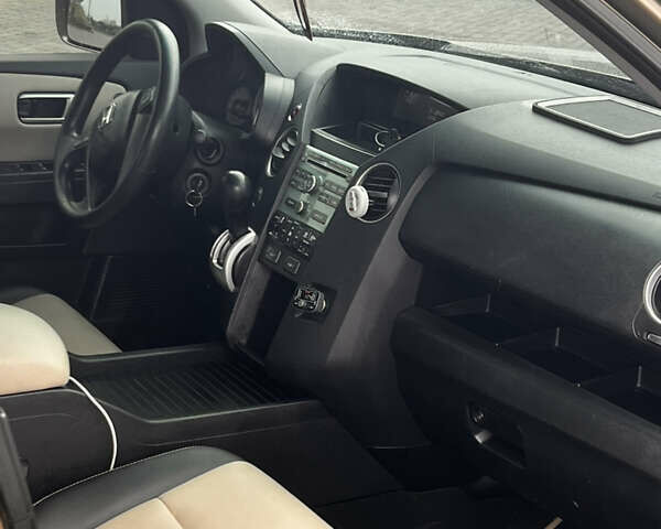 Бежевый Хонда Пилот, объемом двигателя 3.47 л и пробегом 222 тыс. км за 12700 $, фото 14 на Automoto.ua