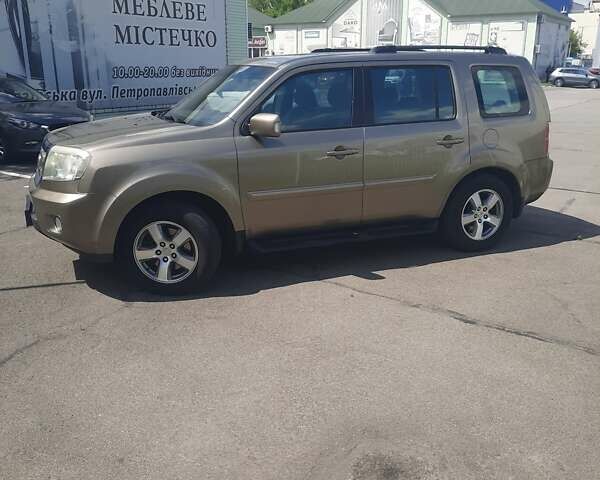 Бежевый Хонда Пилот, объемом двигателя 3.47 л и пробегом 264 тыс. км за 12500 $, фото 2 на Automoto.ua