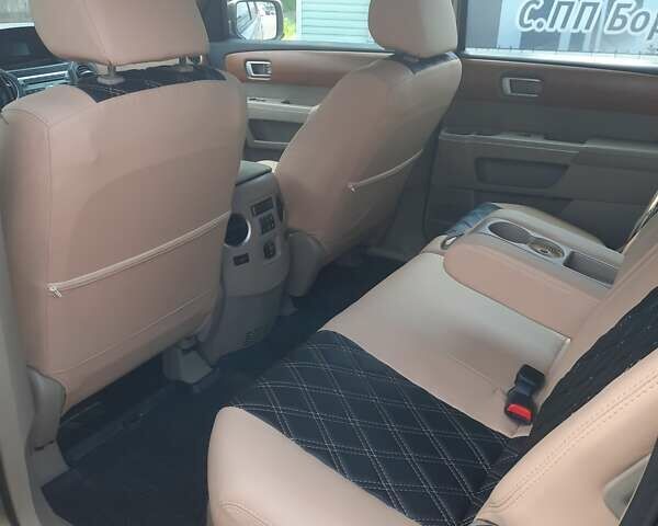 Бежевый Хонда Пилот, объемом двигателя 3.47 л и пробегом 264 тыс. км за 12500 $, фото 14 на Automoto.ua