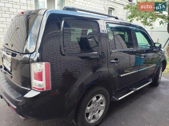 Чорний Хонда Пілот, об'ємом двигуна 3.5 л та пробігом 244 тис. км за 11500 $, фото 4 на Automoto.ua