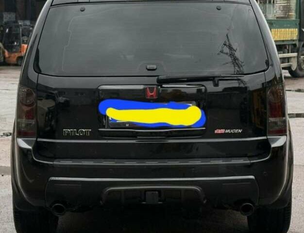 Чорний Хонда Пілот, об'ємом двигуна 3.5 л та пробігом 323 тис. км за 12500 $, фото 6 на Automoto.ua