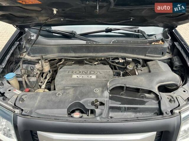 Черный Хонда Пилот, объемом двигателя 3.5 л и пробегом 274 тыс. км за 11500 $, фото 54 на Automoto.ua