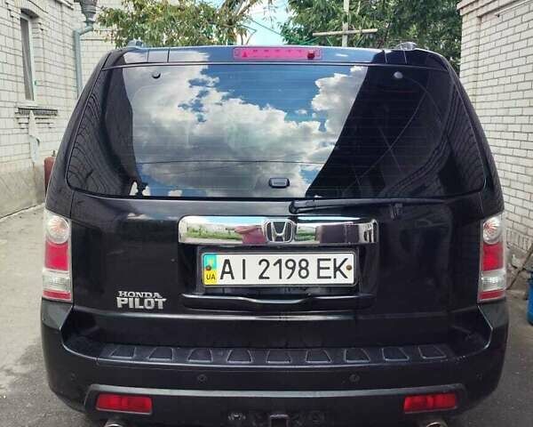 Чорний Хонда Пілот, об'ємом двигуна 3.5 л та пробігом 244 тис. км за 11500 $, фото 2 на Automoto.ua