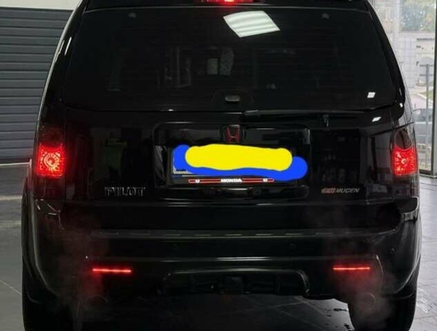 Чорний Хонда Пілот, об'ємом двигуна 3.5 л та пробігом 323 тис. км за 12500 $, фото 8 на Automoto.ua