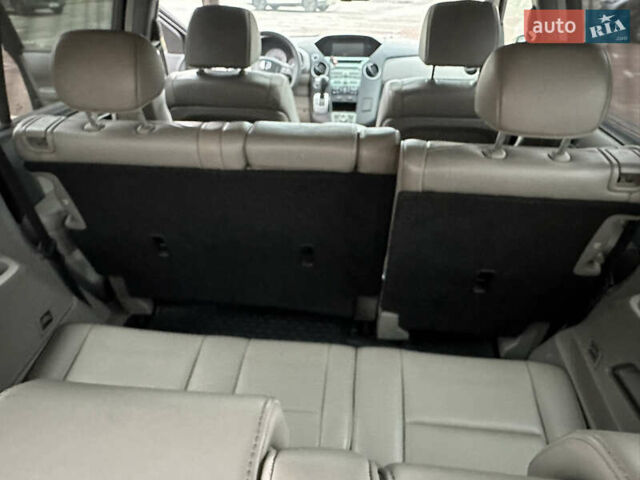 Чорний Хонда Пілот, об'ємом двигуна 3.47 л та пробігом 180 тис. км за 8950 $, фото 43 на Automoto.ua