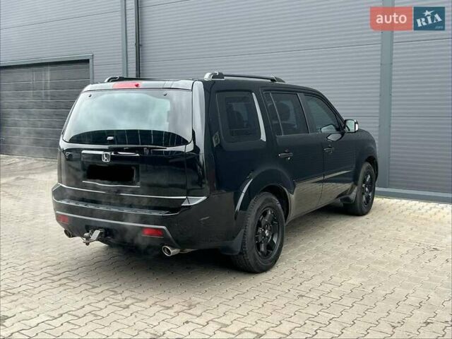 Черный Хонда Пилот, объемом двигателя 3.5 л и пробегом 274 тыс. км за 11500 $, фото 4 на Automoto.ua